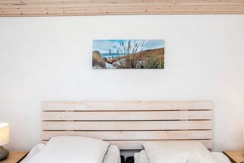 Holiday home on a natural plot with a partially covered terrace near the beautiful Marielyst sandy and bathing beach. The house contains a combined living and dining room in open connection with kitchen corner. Bathroom with washing machine. 2 bedroo...