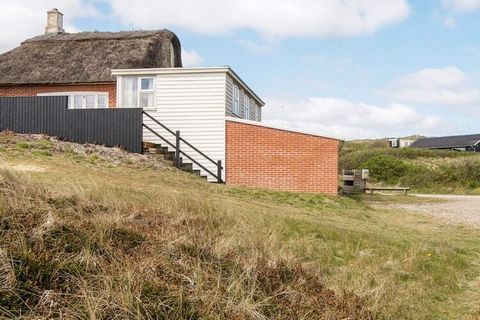 Holiday cottage with great location approx. 300 m from the North Sea and within walking distance to the centre of Søndervig, which makes the house ideal for those who both want to be close to the sea and city life. The house is joined with another ho...