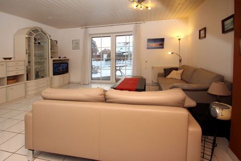 The cozy semi-detached house in the holiday resort of Neßmersiel offers everything you need for a successful holiday: a well-equipped kitchen, comfortable sofas for an evening with friends, quiet bedrooms with comfortable beds and a pretty little gar...