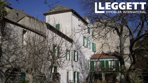 A21853LHS11 - Suitable for bed and breakfast use, or even division into three houses, this is a 15th century stone-built former auberge with five bedrooms, four reception rooms and beautiful hill views, near les Châteaux de Lastours, with a garage an...