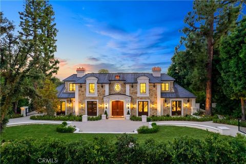 Magnificent Arcadia estate in the highly sought-after Upper Rancho neighborhood designed by the reputable Robert Tong of Sanyao Intl. Newly constructed, this French Country-style mansion features 6 bedrooms, 6.5 baths, and multiple entertainment area...