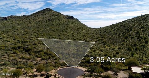 Exceptional private 3+ acre homesite in the exclusive gated community of Legend Canyon. Offering unobstructed views of Pinnacle Peak, Troon Mountain, City Lights, distant Mountain views all from your own private elevated canyon at a remarkably conven...