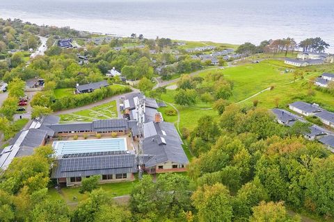 Holiday center Kysthusene in Gilleleje Directly in the open nature, so close to the Kattegat that you can hear and smell it. Pool (indoor and outdoor), sauna, free internet and playground are some of the many facilities the resort offers. Watch movie...