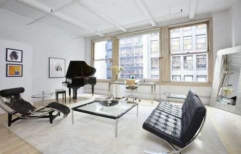 This approx. 1800 sq foot, classic loft sits at the cusp of New York's historic Garment District. While currently configured as a spacious one bedroom, many lofts in the building have been converted into two and three bedrooms (see alternative floor ...