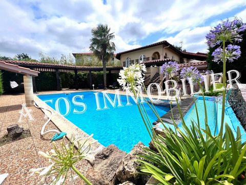 Located in Aire-sur-l'Adour, quiet while being close to amenities, superb villa built in the 70s of 257m2 of living space on 1029m2 of land. It is composed, upstairs, of a living / dining room of 53m2 overlooking a pleasant terrace of 21m2, a billiar...
