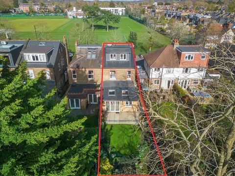 Charming semi-detached Edwardian home, circa 1902, boasting 2,500 sq ft of living space opposite St Mary's University playing fields. This elegant residence retains numerous period features and spans three floors. The ground floor with a ceiling heig...