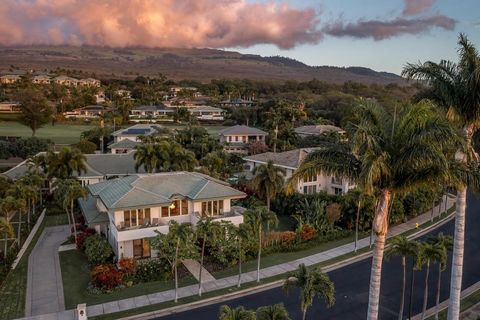 Enter this elegant Wailea Golf Vistas home through the bespoke etched glass door in to a 2 story atrium featuring a baby grand piano and a dramatic spiral staircase. The custom designed and built home includes high ceilings, a heated pool and spa and...