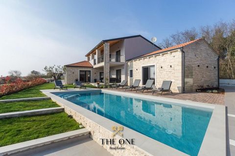 Beautiful stone villa is located in a charming Istrian environment, not far from Tinjan. The spacious villa is spread over two floors and offers an extraordinary living space. Luminous and airy interior of the villa consists of an open plan space tha...