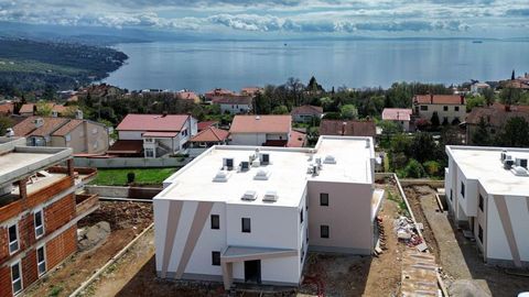 Villa in a row with a view of the sea in Pobri, Opatija!, 1 km from the sea! In our exclusive portfolio, we are thrilled to present a splendid project located near Opatija. The development comprises two residential buildings, each featuring three uni...