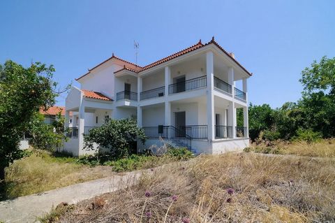 Luxury villa with sea views, in the center of the seaside village of Kato Diminio, Kiato. I was built in 2003. The distance from the beach is 80 meters. The villa extends in 3 levels and it is 380 sq.m. on a plot of 1810sq.m. in which there is an add...