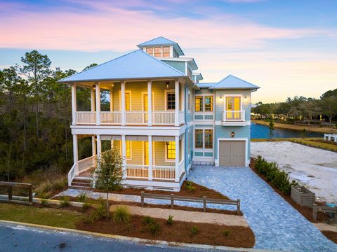 Nestled in the final phase of WaterColor within the sought after Park District, this newly constructed edifice offers the epitome of luxury coastal living. The expertly planned design spanning four distinct levels and over 4,700 square feet was draft...