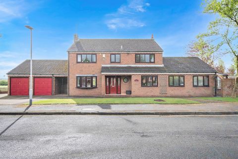 The living accommodation is flooded with natural light and briefly comprises of a welcoming entrance hall which flows to the ground floor accommodation. There are a number of large reception rooms which include a dual aspect sitting room with patio d...
