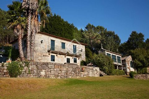 Inland in the Rias Baixas, a short distance to the Vigo Estuary, we find this special property with a lot of charm, character, and private land. The villa sits on two levels of space, offering lovely inner courtyards, good stone finished craftsmanshi...