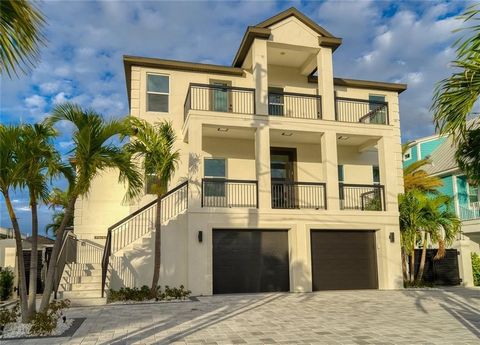 JUST REDUCED BY $300K!!! I Am Poised At Their Postcard Perfect Picture Window Both Symmetrically Square And Rectangular All At Once..This Window Frames An Ever Engaging Panorama of The Full Breadth Of The Clearwater Beach Marina, And The Intracoastal...