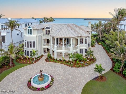 Embraced by the sparkling waters of the Gulf & the mesmerizing Bay, this extraordinary estate, Dolphins Crossing, offers unparalleled luxury and rare waterfront living. Spanning from Gulf to Bay, this breathtaking property is truly a unique find. A s...