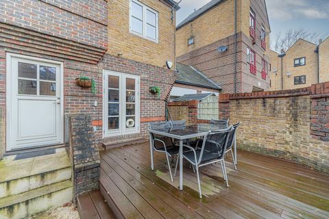 Nestled in a sought-after corner of Surrey Quays, SE16, this stunning three-story home in Trafalgar Close offers impeccable living spaces and modern comforts. The property boasts a cosy lounge with feature walls and a bright kitchen/diner with direct...