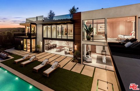 The apex of modern sustainable luxury has arrived in the prestigious Pacific Palisades Riviera. Completed in 2024 with the highest attention to detail, this elevated California Contemporary oasis was designed to seamlessly integrate indoor/outdoor li...