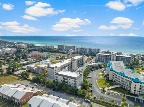 Indulge in coastal luxury with this fully remodeled 2-bedroom, 2-bath condo in Miramar Beach's desirable Alerio complex. This 995 sq. ft. ground-floor unit offers an open-concept layout with 9-ft ceilings, crown molding, hardwood flooring throughout,...