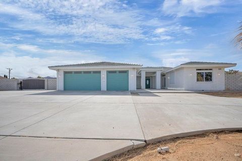 Endless Opportunities Await! Discover the potential of this spacious desert retreat in the heart of Yucca Valley. Situated on a generous lot, this home is ready for your personal touch, offering a large garage, an inviting pool, and ample space to cr...