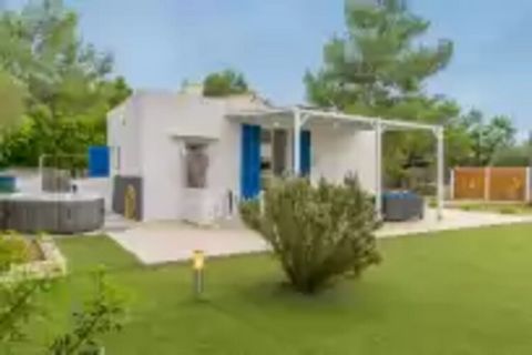 This small house by the sea will be your special refuge during your vacation days. Outside you will find yourself in the middle of the countryside, in a beautiful garden where you can enjoy the Mallorcan sun and relax in the jacuzzi with water at roo...