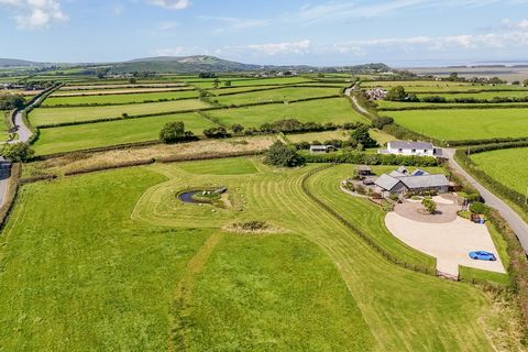 Welcome to Mulberry House, a stunning 3-bedroom stone barn conversion located in the heart of Gower, Oldwalls. Set within over 4 acres of beautifully maintained grounds, this South-facing property offers breathtaking views of the Gower countryside, C...