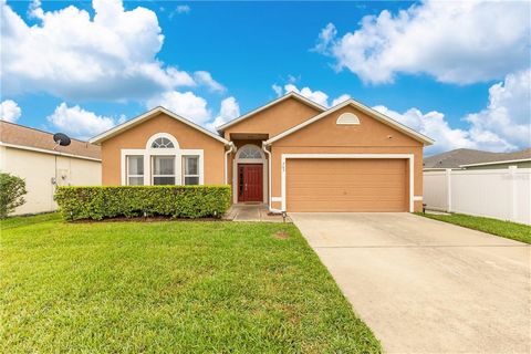 Welcome to this beautifully maintained 4-bedroom, 2-bathroom home nestled in the heart of Winter Garden! This home greets you with curb appeal from the moment you arrive with its lush green lawn and neatly manicured hedges and bold red front, offerin...