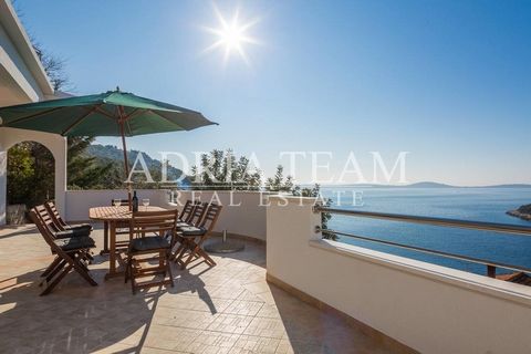 Beautiful apartment for sale, with panoramic sea and mountain views, near Trogir - Vinišće. The facility has 3 residential units and is located on a cascade plot of 660 m2. The plot also has a summer kitchen with a bedroom and toilet. The house is 15...
