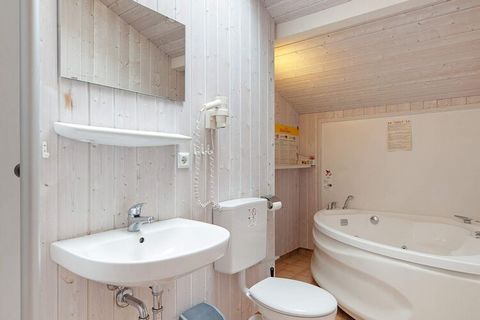 This comfortable quality house in Danish building style from 2008 is located in OstseeStrandpark Grömitz approx. 200 m from the lovely sandy beach with a short distance on foot or by bike to the city center. The house has panoramic windows, furniture...