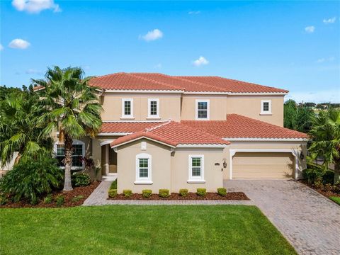 PRICE IMPROVEMENT!!! Welcome to John's Lake Overlook Drive and experience a luxurious Florida lifestyle in the Gated-Community of Hickory Hammock with this spectacular Screened-In POOL & POND-VIEW residence built in 2015. This gorgeous two-story home...