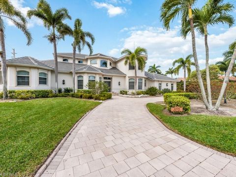 Experience this luxurious 4 bedroom +den, 5.5 bath, 5672 sq/ft estate home with 3 car garage and enjoy the expansive sunset views over the Tom Fazio designed golf course. Recently updated with new roof, storm smart shutters, new pool cage screens and...