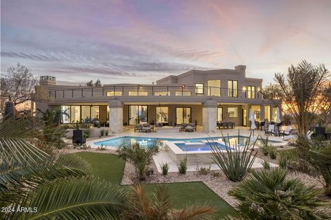 Just Now Completed! An Exceptional Contemporary Luxury Masterpiece in North Scottsdale Pinnacle Peak corridor - amongst the most desirable addresses in the entire Valley. A private sanctuary spanning 4.5-acres of a lush desert setting, embrace a once...