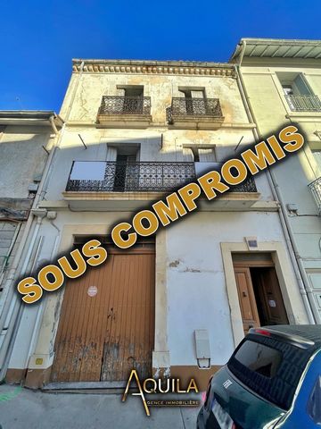 Close to the city center: a townhouse to renovate with garage. On 3 levels several possibilities, including a division. Agence Aquila, RCS Montpellier, SIREN 410 441 539. Contact: Arnaud Vauché at ... https:// ... / Features: - Balcony