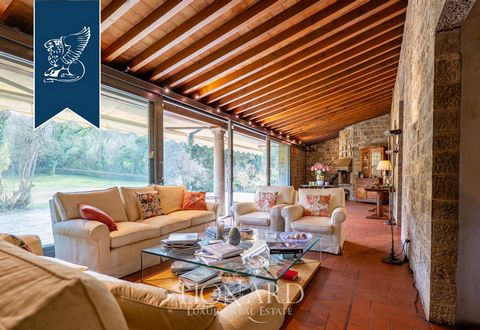 Prestigious villa for sale in a dominant position between the Florentine hills, a few minutes from the historic center of Florence. The property, immersed in a ground of 5 hectares, consists of a master villa of about 500 square meters and a pretty d...