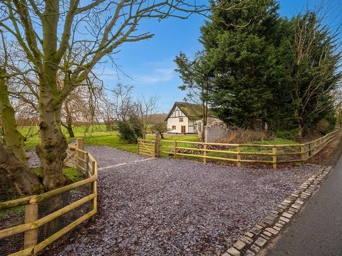 Welcome to Oulton Lowe Green, a stunning historic, Grade II listed timber framed, thatched cottage, situated just 4 miles outside of the bustling village of Tarporley and set in the most beautiful Cheshire countryside, on a 0.7 acre plot, with the op...
