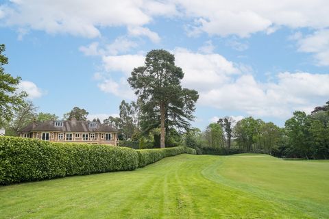 Situated on the main island of the highly sought-after Wentworth Estate, is this magnificent family home. Overlooking the championship West golf course, the property has been thoughtfully designed to offer luxury and a versatile home, suited for ente...