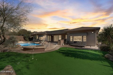 Discover the epitome of luxury living in Scottsdale! This remarkable single-level home features 5 beds, 3.5 baths, an office, a home theater, and a 3-car garage, all complemented by an extraordinary backyard. The spacious chef's kitchen, complete wit...