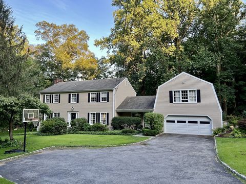 Exceptional home and exceptional location on Darien line in the sought after area of West Norwalk. Tranquility set at the end of a private driveway on 2.11 secluded acres of rolling lawn, stone walls and peaceful woodland on one of the most impressiv...