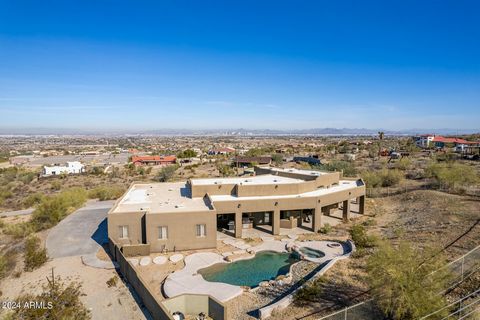This location can't be matched with breathtaking city and valley views in this 2018 remodeled southwest-inspired home. No HOA restrictions provide freedom. Enjoy open architecture, separate living and family rooms, and a stunning primary bedroom retr...