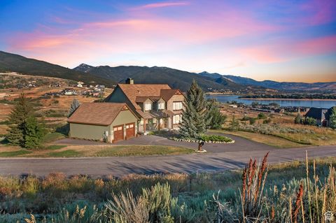 Spectacular, 5,600 plus square foot home, perched on a ridge below Snowbasin on open space above wildlife corridors with stunning, protected, panoramic views of the Resort's peaks, Pineview Reservoir and the idyllic beauty of the Ogden Valley. Enjoy ...