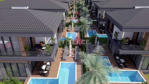 Villas independientes con piscina privada en Döşemealtı, Antalya. Las villas independientes en Döşemealtı, Antalya, cuentan con infraestructura de sistema de energía solar, sistema de riego automático de jardines y sistema de calefacción por suelo ra...