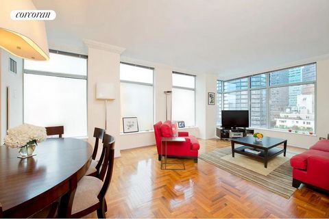 Immaculate Huge Corner Two Bedroom Two Bathroom with Gorgeous Three Exposure Views in One of the Most Desirable Condo Buildings in Midtown East! This Apartment Features Oversized Windows, Hardwood Floors, Washer/Dryer in Unit, Marble Bathrooms, Stain...