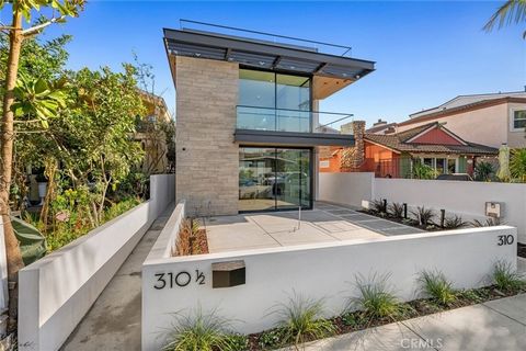 This brand-new modern residence, designed by Horst Architects and DeCarrier Design and built by Montesantos builders, offers sophisticated living with exceptional craftsmanship. Featuring 2 bedrooms and 2.5 bathrooms, the home is designed to maximize...