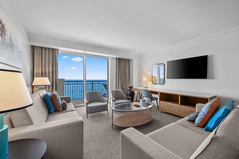 Live the dream where the ocean meets opulence. This 1-bedroom, 2-bath masterpiece, with a den stylishly outfitted as a second bedroom, offers uninterrupted direct ocean views that redefine the meaning of luxury living. Fully furnished and turnkey, th...