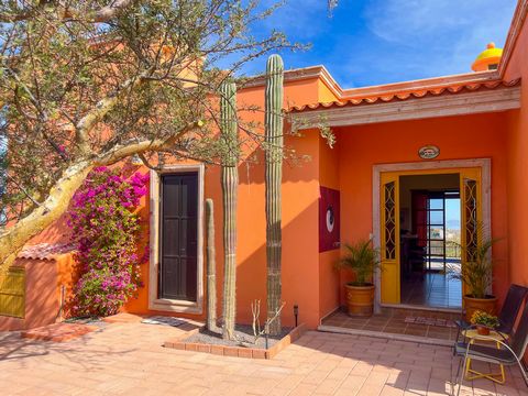 Discover your private oasis with this 2 bed 2 bath home plus self contained 1 bedroom casita ideal for guests or extra income . Perfectly situated on an ocean and mountain view lot in El Centenario the stunning landscape features vibrant plants trees...