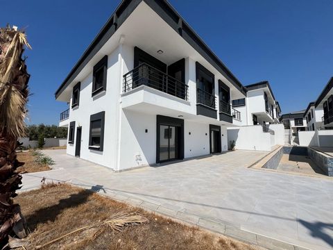 This newly completed modern semi-detached villa in Didim offers a wonderful living space that is both aesthetically pleasing and functional. With three bedrooms and two bathrooms, the villa provides a spacious living environment, ideal for families. ...