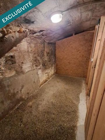 Grande cave dans copropriété sécurisée