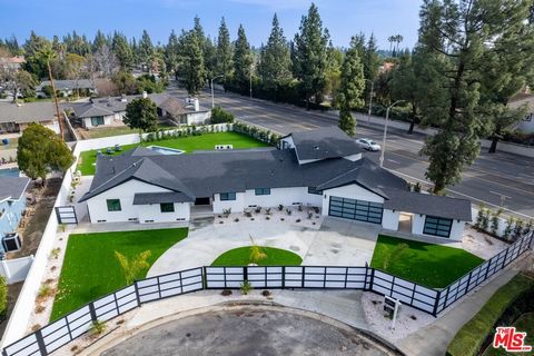 Huge price Reduction. Bring all your buyers. Discover the epitome of luxury living at 10306 Beckford Ave, An opulent Residence Nestled in the prestigious Devonshire Country Estates of Porter Ranch, A gated haven, built in 1959 all fully Remodeled. Bo...
