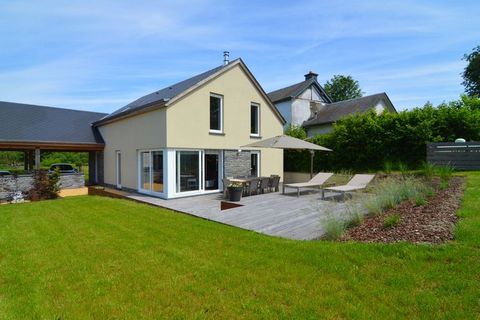 This stylish holiday home with 4 bedrooms is located near Houffalize. It's ideal for families with children or a group of 8 and it features a very spacious garden and a sauna. In Houffalize, you'll find shops and restaurants. The area around Houffali...