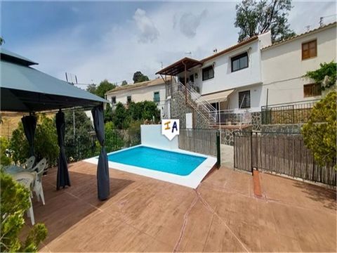 This quality spacious 295m2 build 4 bedroom, 2 bathroom Townhouse with a pool and big garage / workshop is situated in the charming and lively village of Mures, just a short drive to the bustling city of Alcala la Real in the south of Jaen province i...