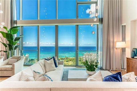 A truly one of a kind offering with three levels of elegance! The first level welcomes you with soaring, 25-foot ceilings and window walls framing the famous Waikiki beachline with a mix of park views and city lights in the evening. Each bedroom feat...